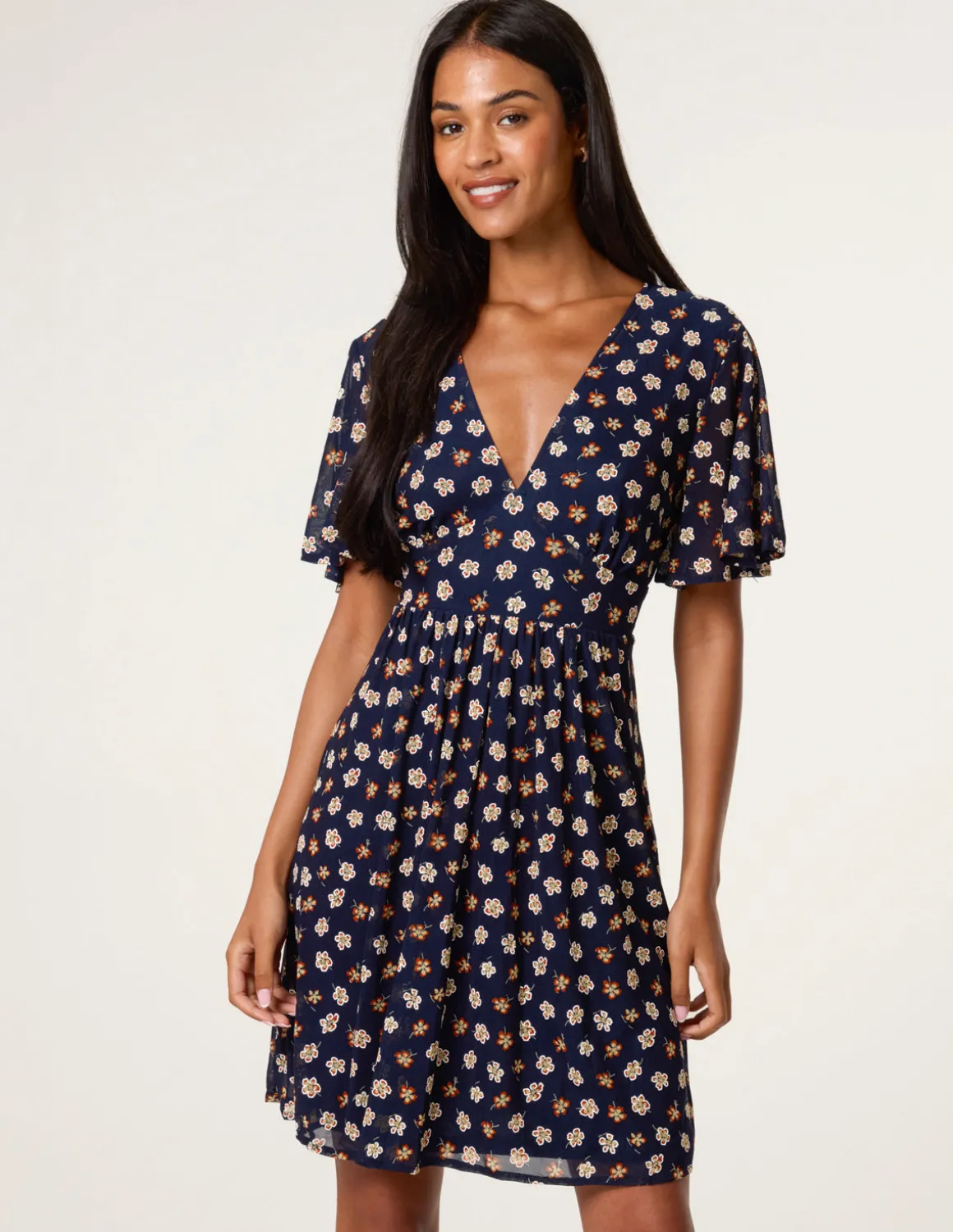 Ditsy Floral V Neck Tie Back Mini Dress