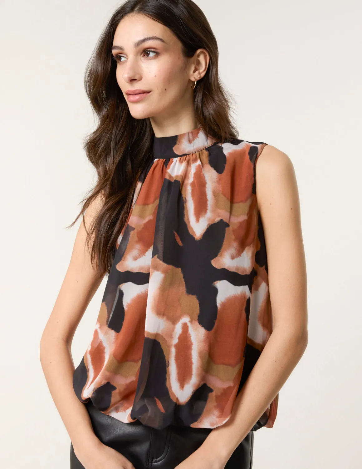 Printed Sleeveless Puff Hem Blouse